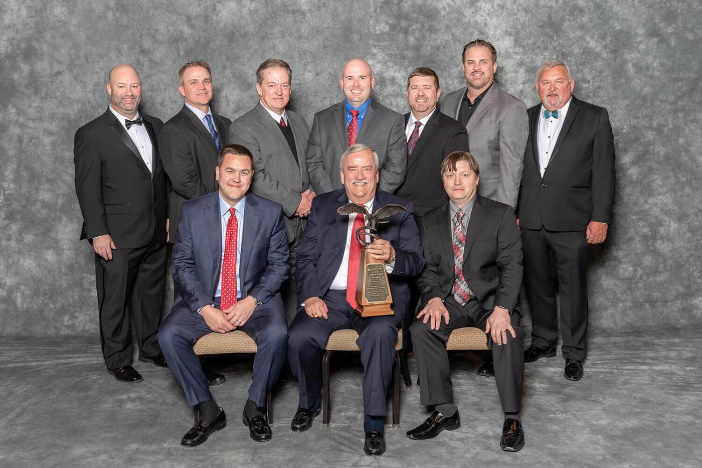 Mid-Western Commercial Roofers team receiving an industry award