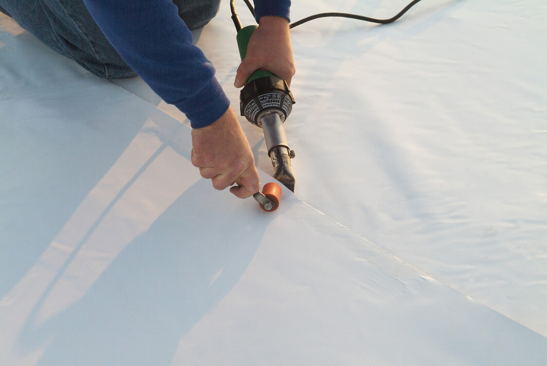 Heat-welding repair on a single-ply commercial membrane